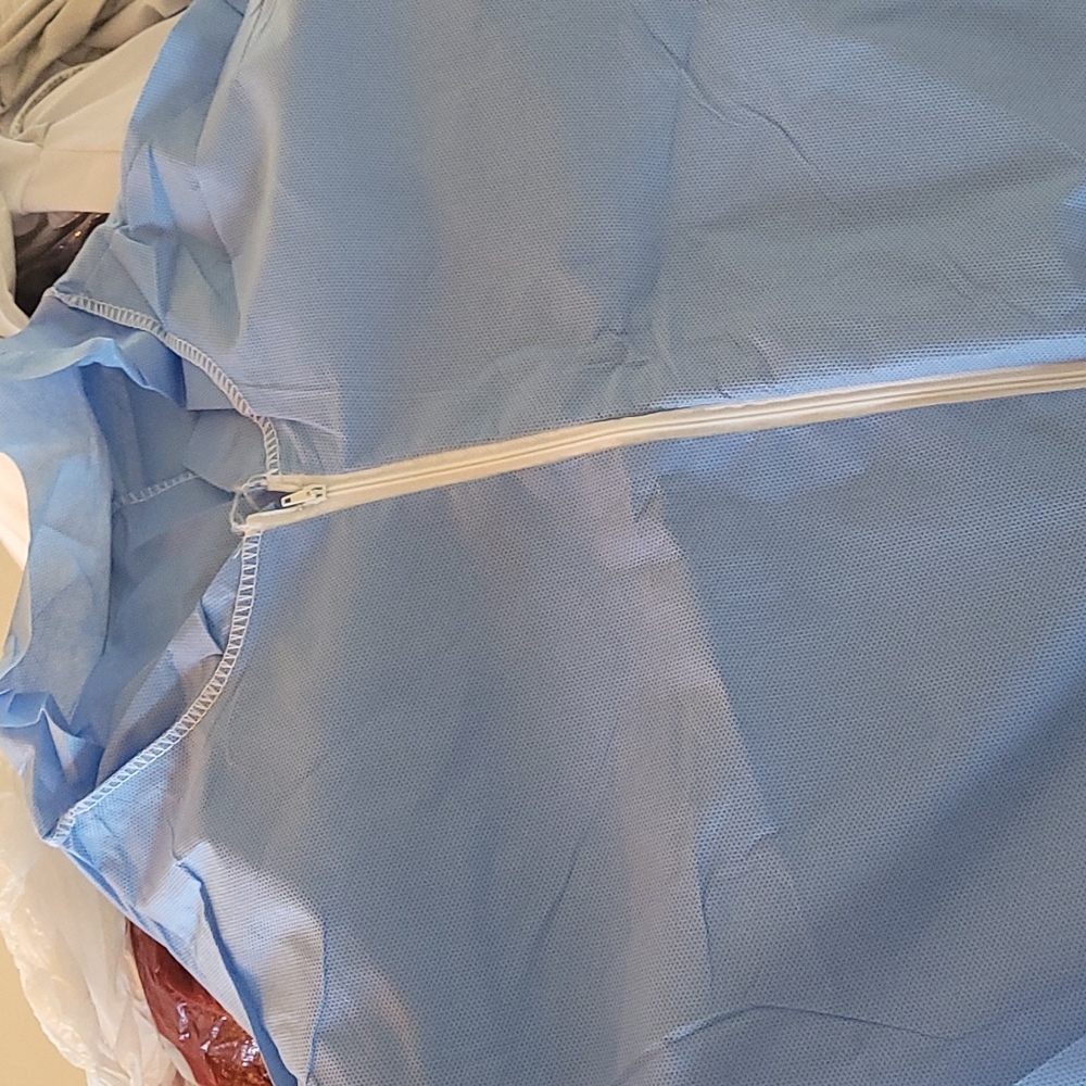 2 waste management or hazmat paper suits